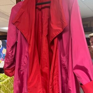 Luii RaincoatTwo-Tone Pink and Red trapeze Raincoat and it's REVERSIBLE!!!